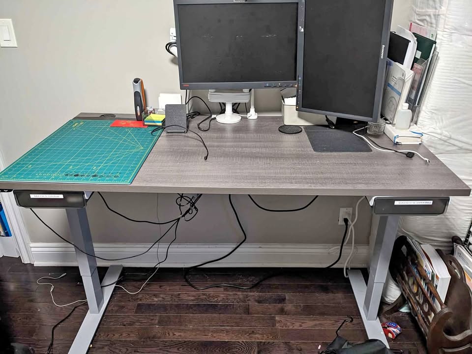 Bestar Sit and Stand Desk with Monitor Arms