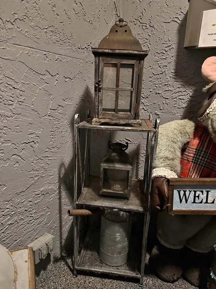 Small weathered lantern and glass panels