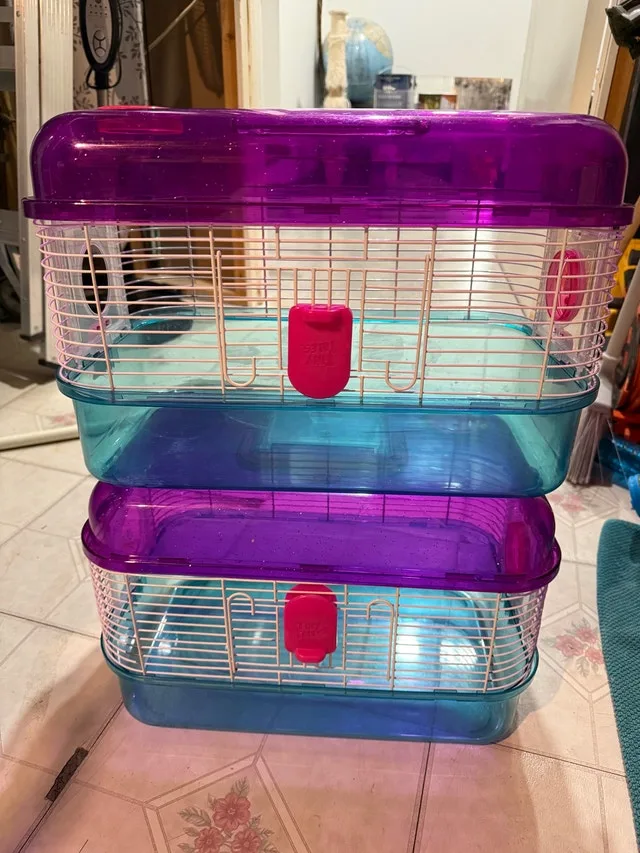 2 hamster cages with connecting tubes