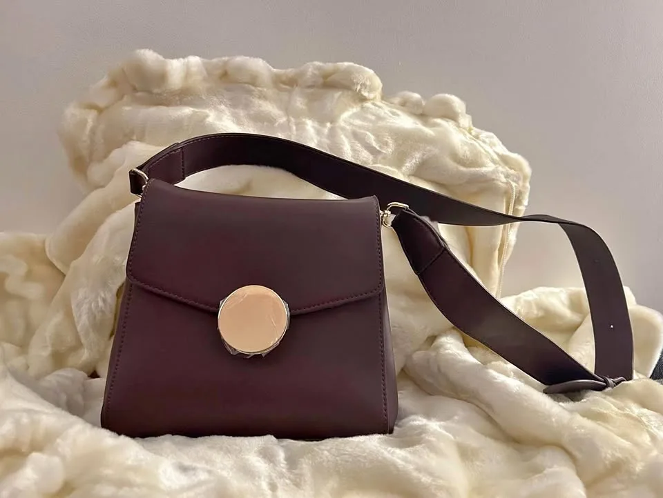 Luxury Leather Crossbody Bag with Gold Accent