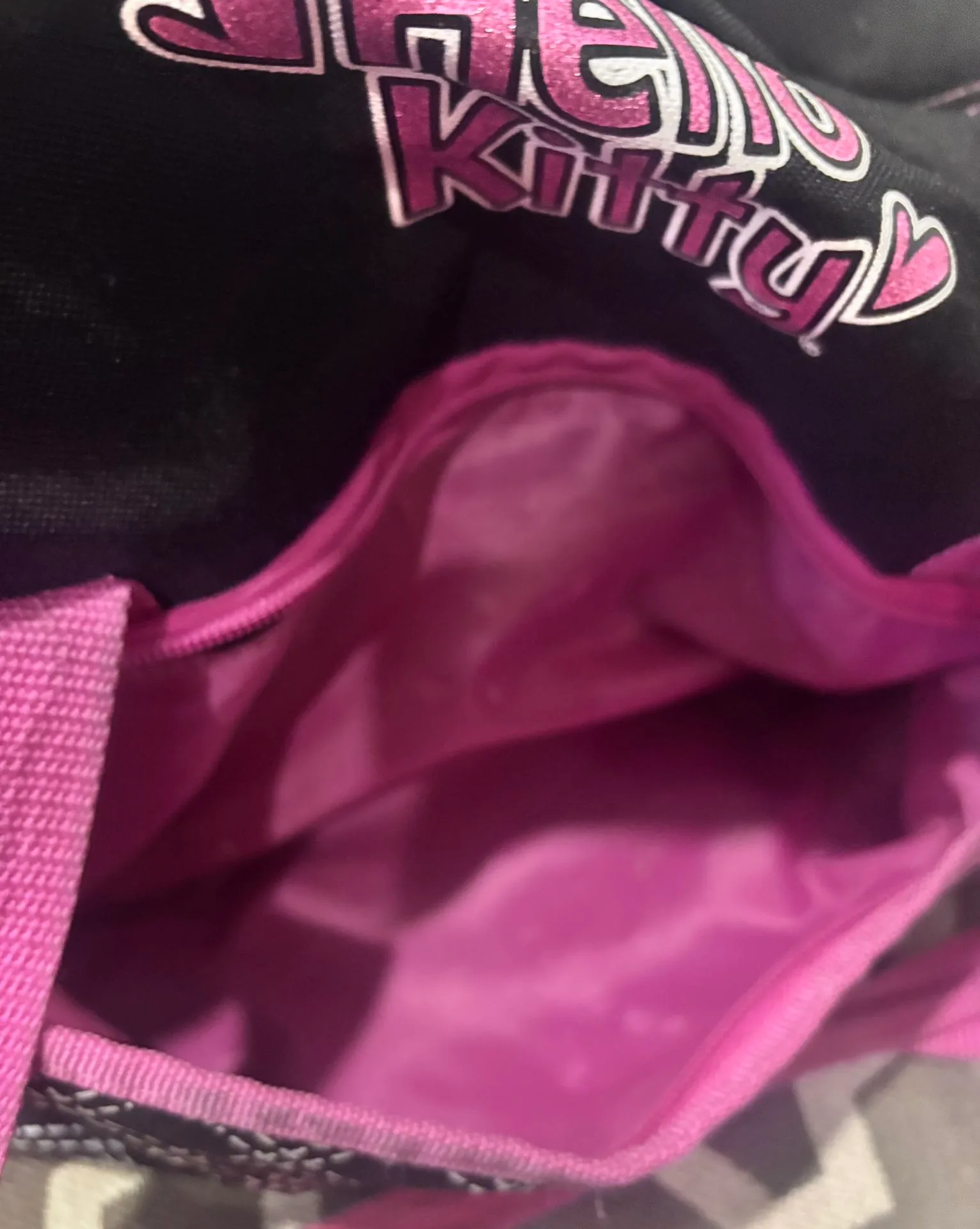 Super cute Hello Kitty duffel bag in black with pink trim and qu image indicator(7)