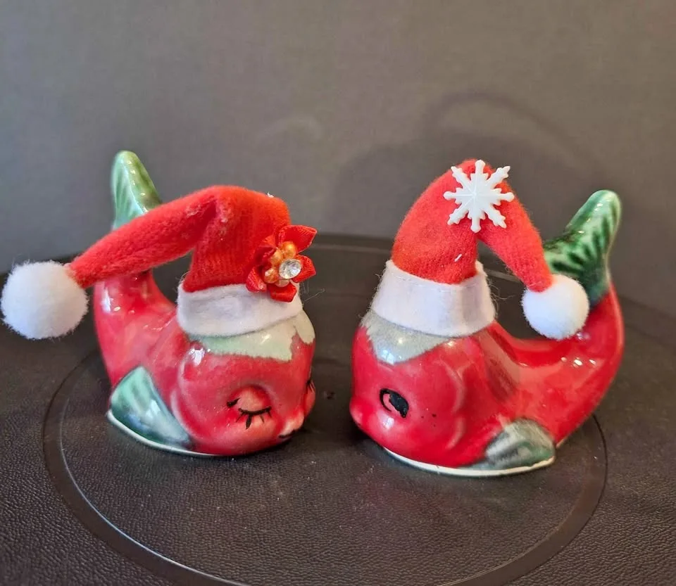 Vintage red and green glazed dolphins fish.