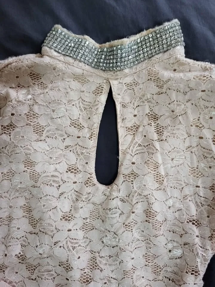 Cream color Fitted dress with stones around the neck image indicator(2)