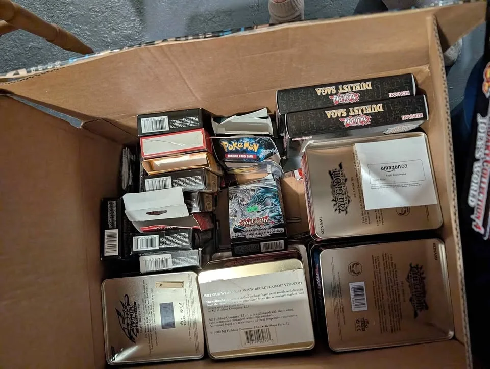 empty yu gi oh and pokemon boxes and tins