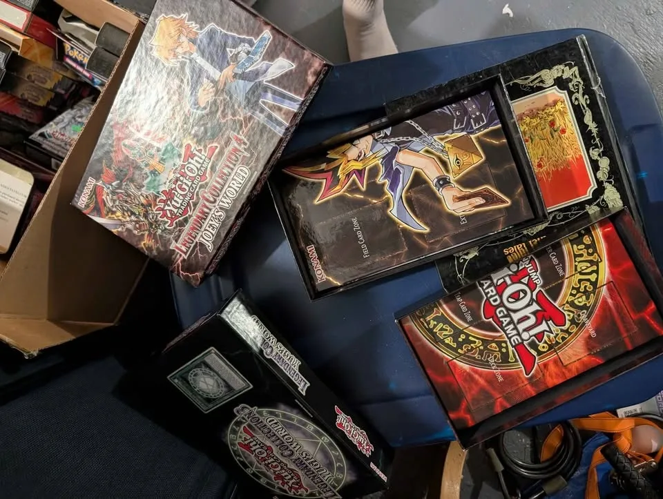 empty yu gi oh and pokemon boxes and tins image indicator(2)