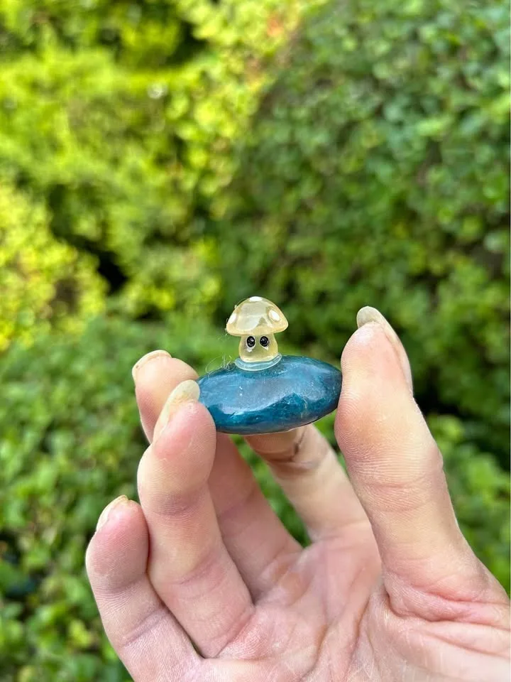 Apatite Polished Tumbled Stone with Luminous Orange Mushroom Bra