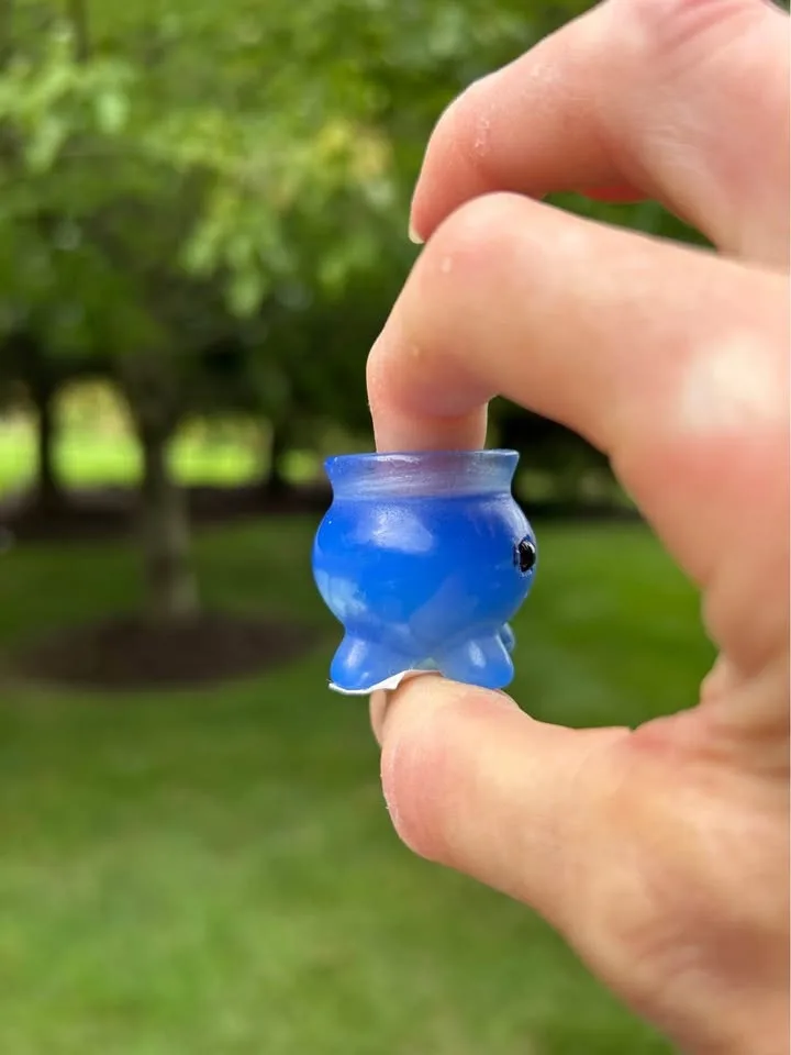 Blue Opalite Crystal carving with black jade eyes New image indicator(4)