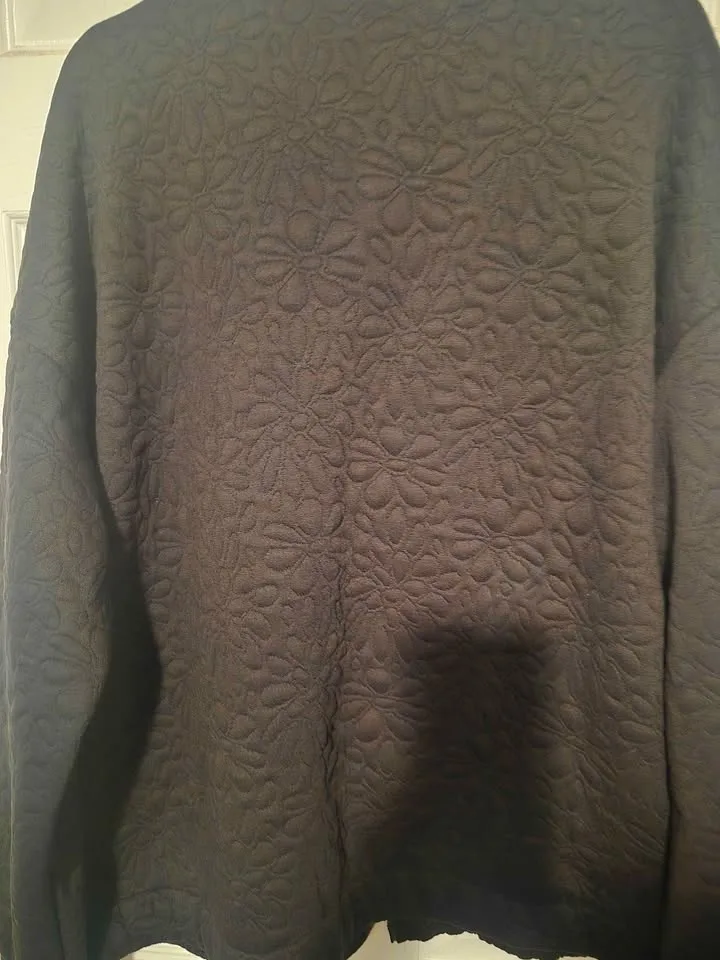 Black quilted bomber style jacket image indicator(3)