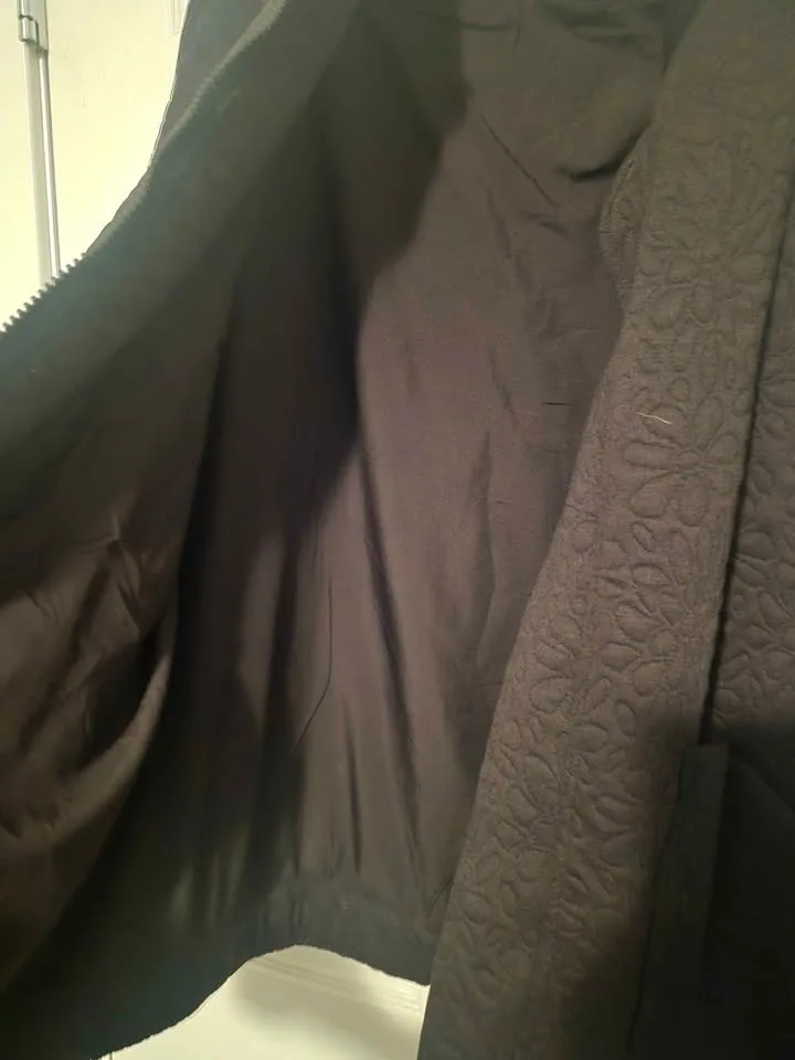 Black quilted bomber style jacket image indicator(4)