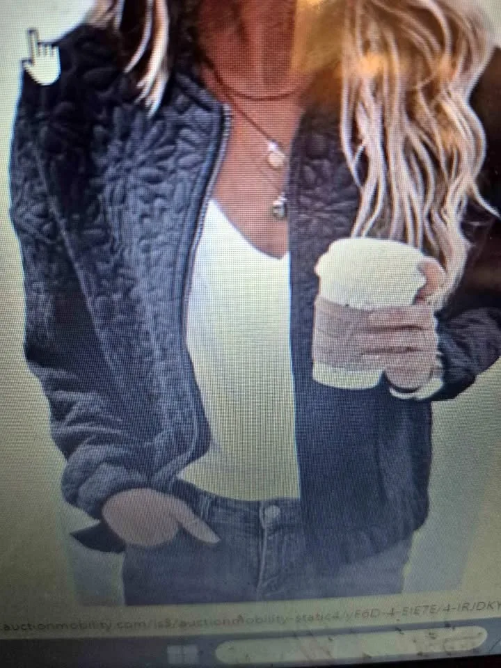 Black quilted bomber style jacket