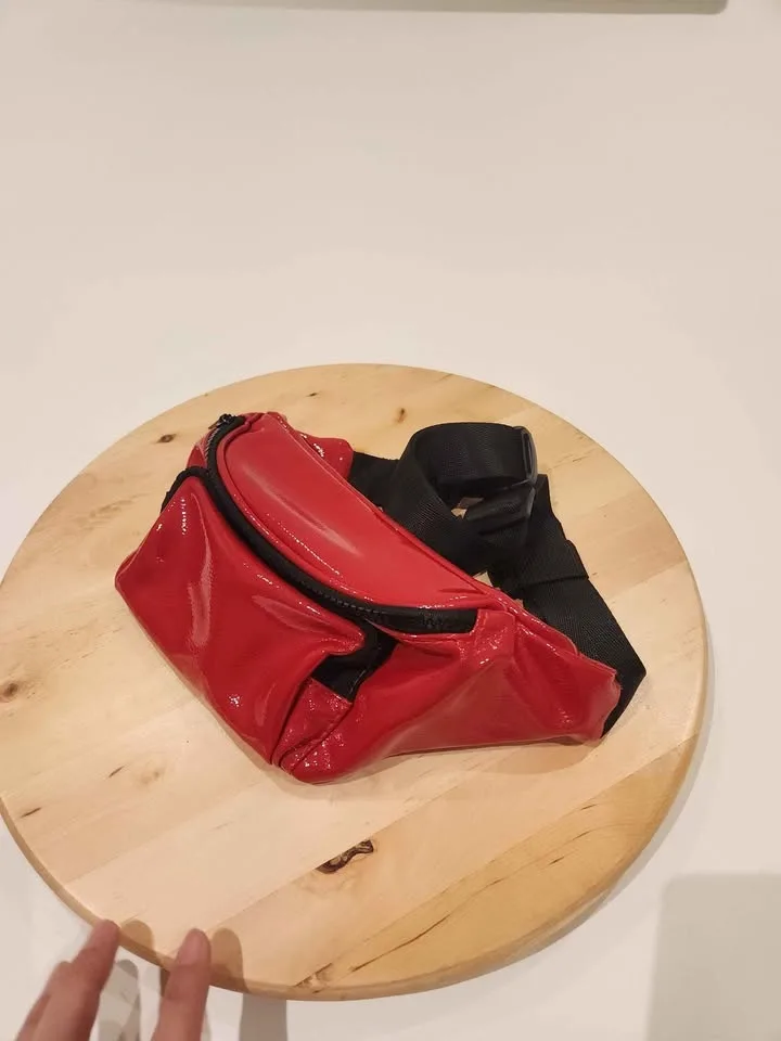 Shiny red fanny pack image indicator(2)
