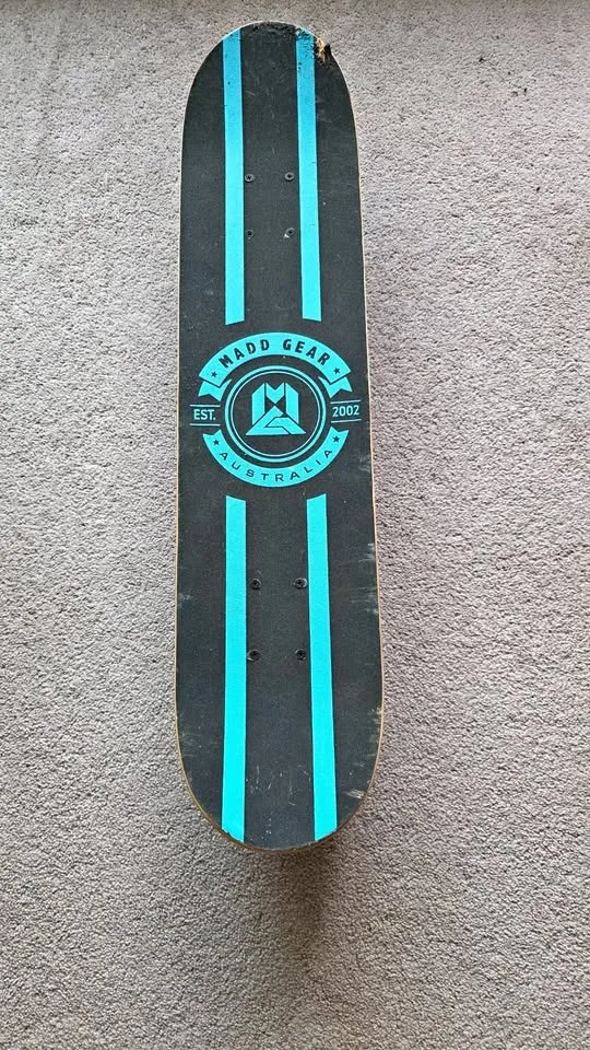 Skateboard brand madd gear.