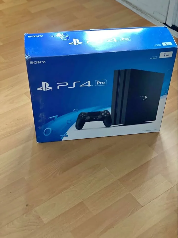 PlayStation 4 Pro 1TB Console, 3 controllers and 3 games