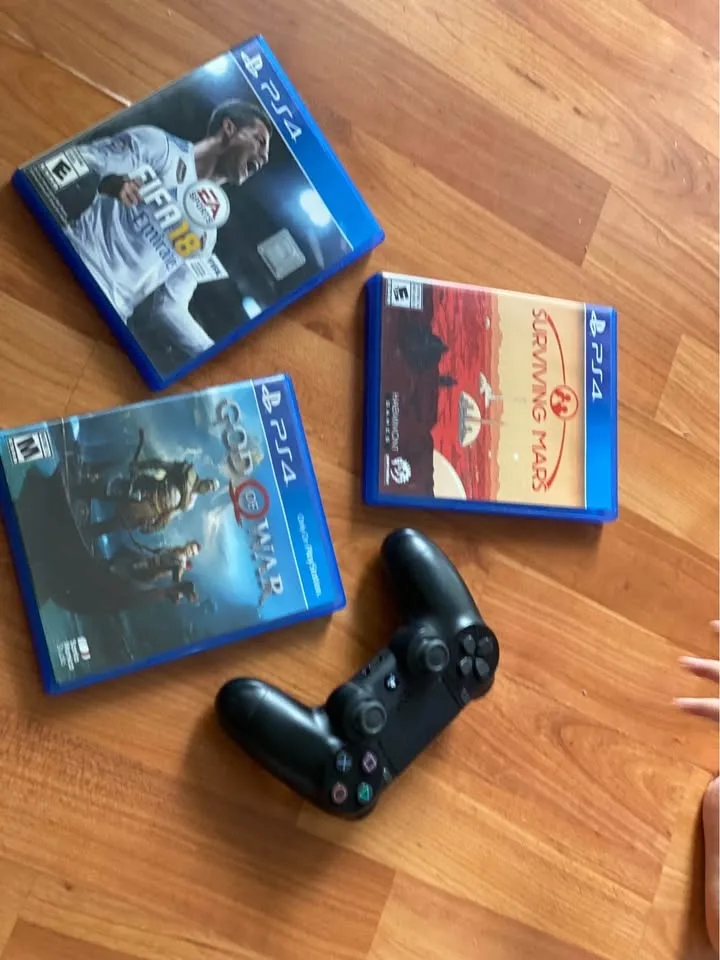 PlayStation 4 Pro 1TB Console, 3 controllers and 3 games image indicator(3)