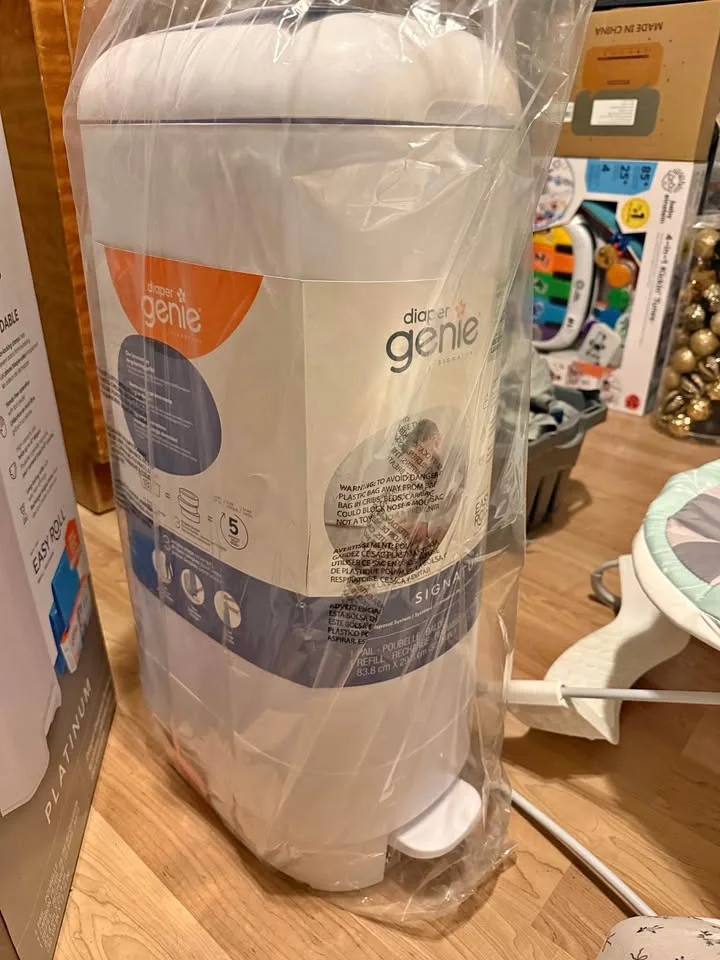 Diaper genie Signature pail. refill with 18 bags