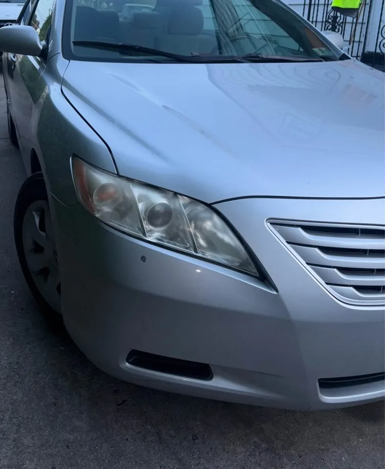2009 Toyota Camry · LE Sedan 4D image indicator(4)