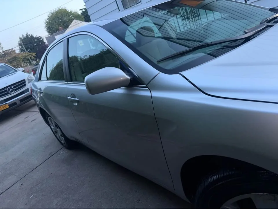 2009 Toyota Camry · LE Sedan 4D image indicator(6)