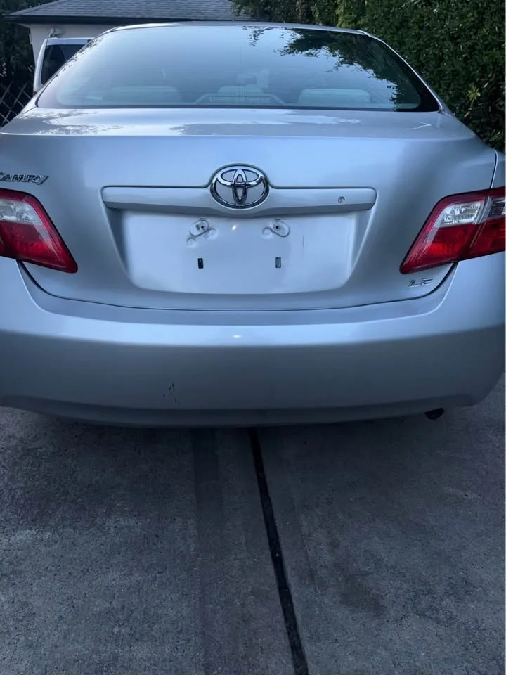 2009 Toyota Camry · LE Sedan 4D image indicator(9)