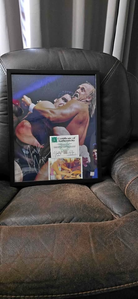 Signed Hulk Hogan poster w/coa
