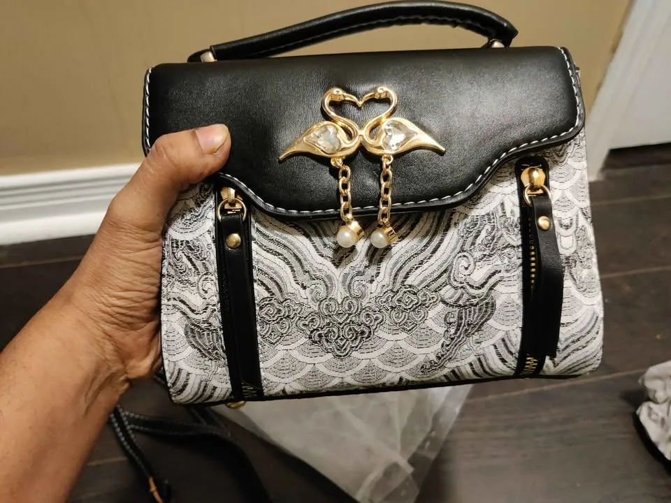 Brand new small and stylish black & white women hand bag image indicator(2)