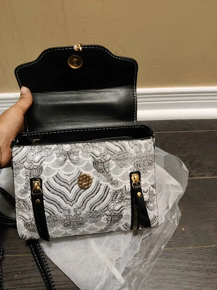 Brand new small and stylish black & white women hand bag image indicator(3)