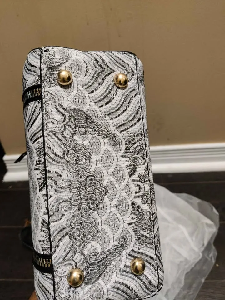 Brand new small and stylish black & white women hand bag image indicator(4)