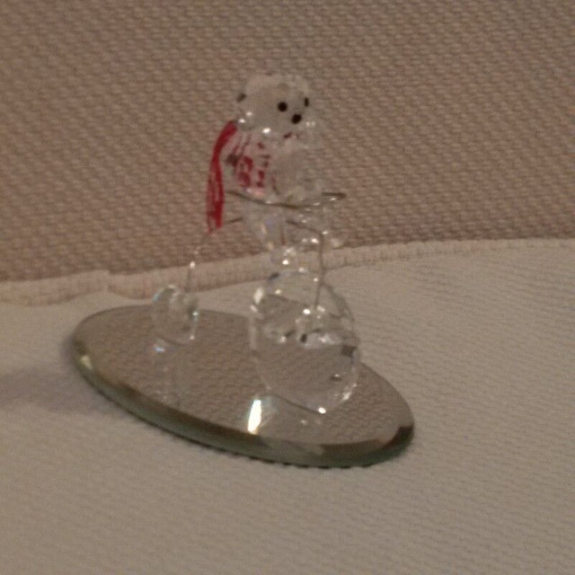 Crystal Dog on Bicycle figurine