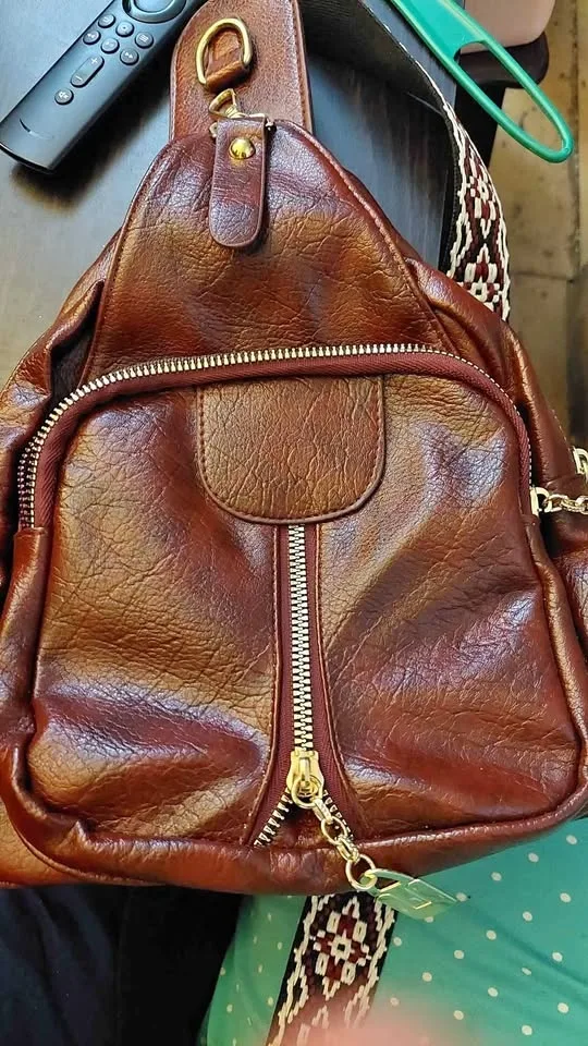 Red faux leather cross body bag