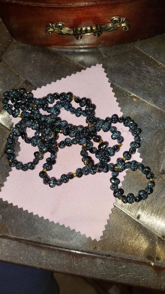 Long blue beaded necklace