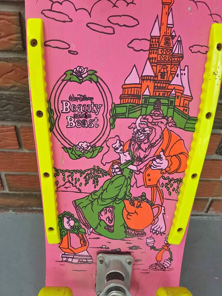 Vintage pink Beauty and the Beast skateboard