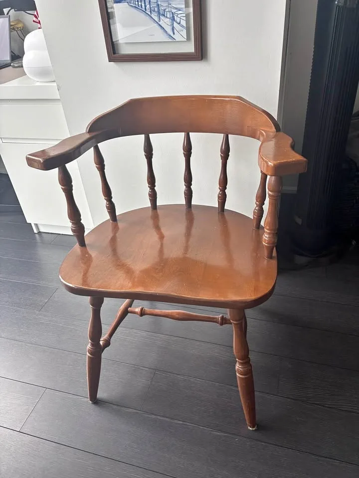Wide antique wooden captain chair