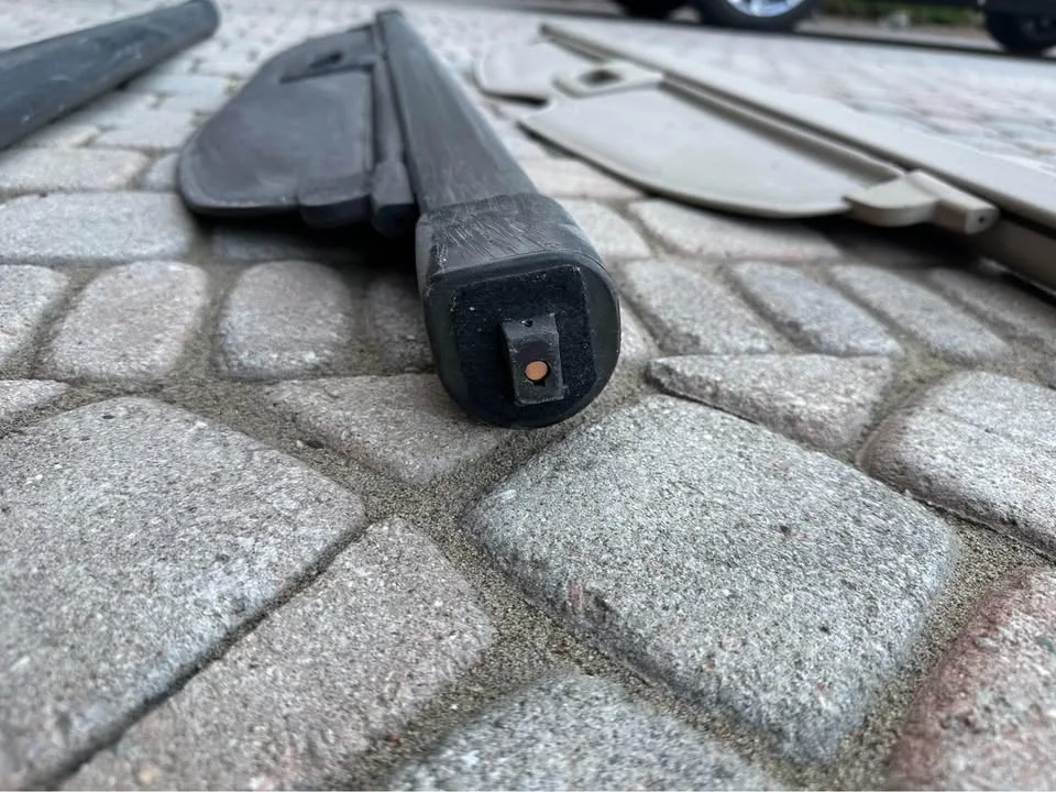 Three - Rear trunk retractable cargo cover black and beige tan image indicator(4)