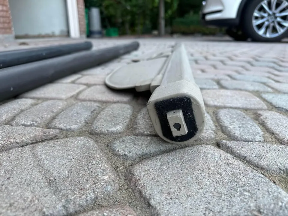 Three - Rear trunk retractable cargo cover black and beige tan image indicator(5)