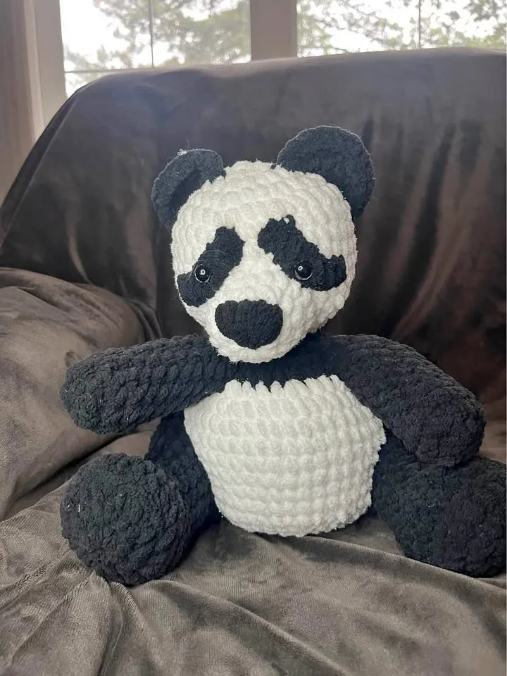 Handmade crochet panda bear toy