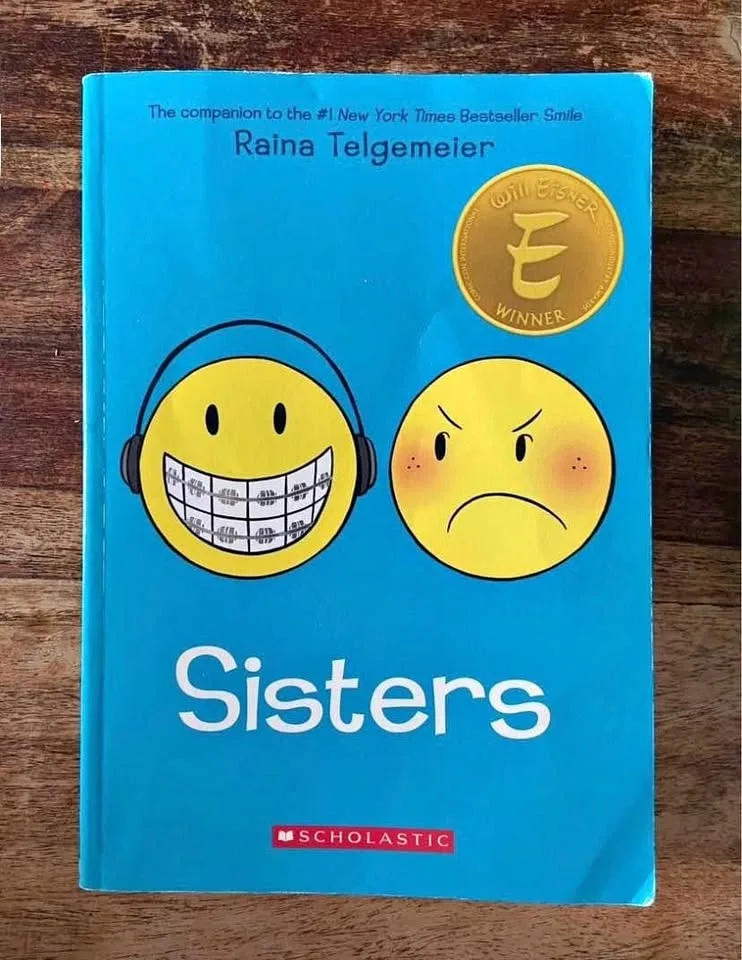 GUC: Sisters -Graphic Novel Book by Raina Telgemeier