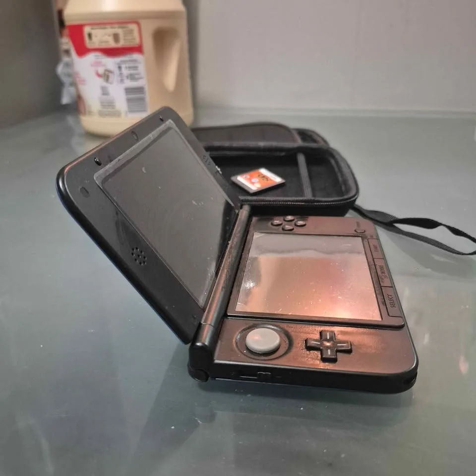 3ds xl handheld gaming system bundles, comes with games , stick image indicator(7)
