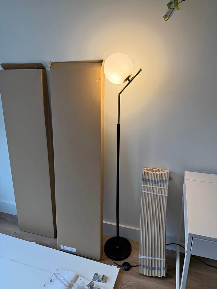 sphere lamp with gold and black base