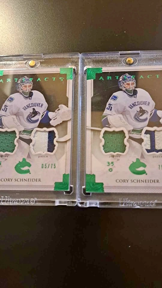 2013-2014 Upper Deck artifacts, Cory Schneider, two card lot