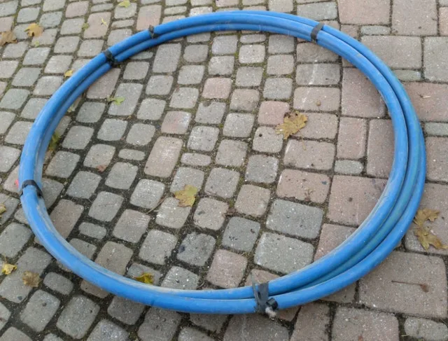 High pressure vinyl pipe 47feet long NEW call text 705 440 9159 image indicator(2)