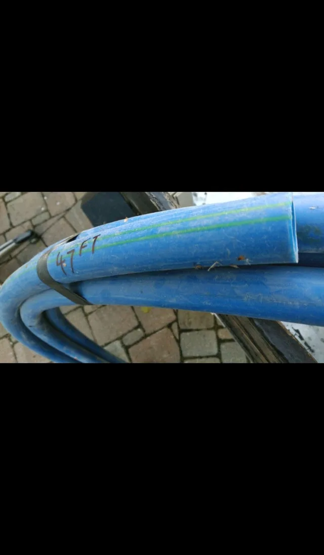 High pressure vinyl pipe 47feet long NEW call text 705 440 9159 image indicator(4)