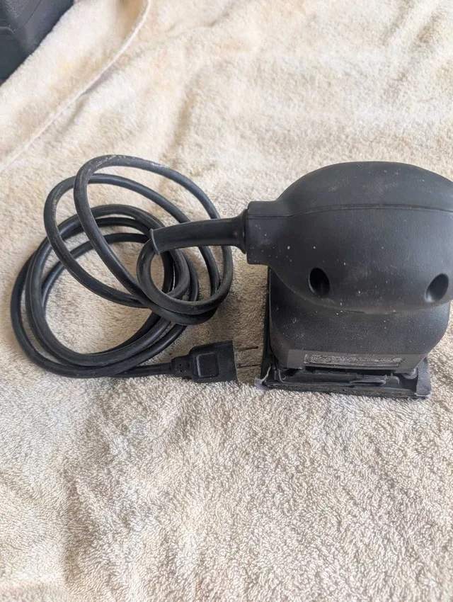 Palm sander Black& Decker image indicator(2)