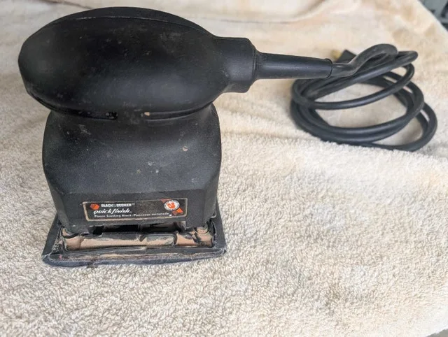 Palm sander Black& Decker image indicator(4)