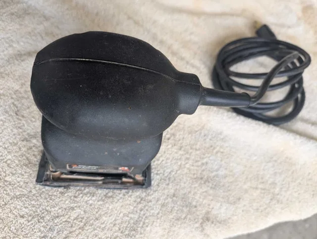 Palm sander Black& Decker image indicator(5)