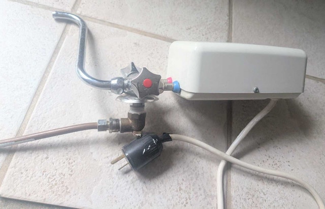 Instant hot water faucet used $50 New$120 - photo 2