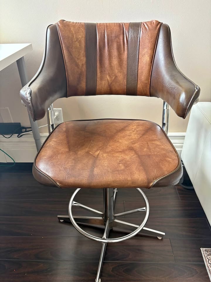MCM tall swivel chair