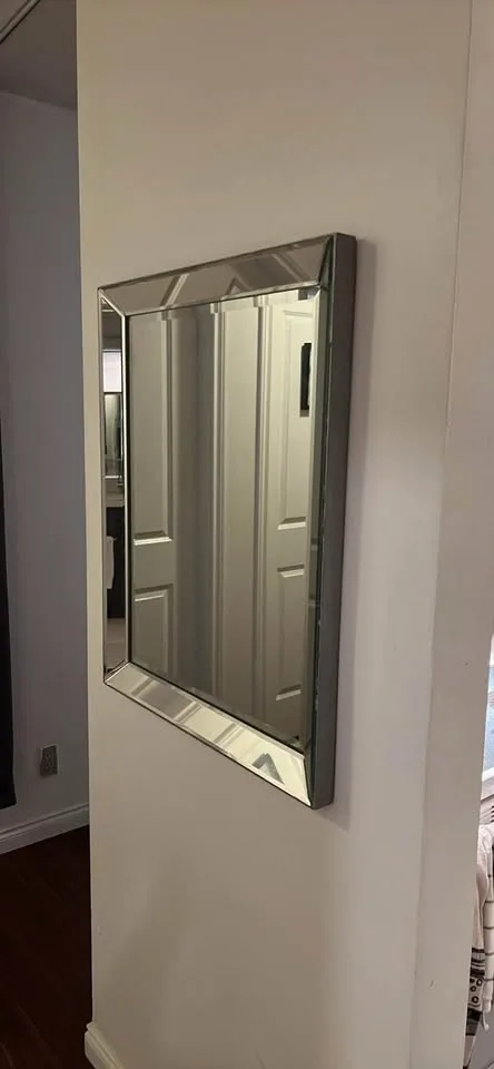 Small bezelled mirror in good condition image indicator(2)