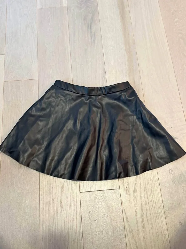 H&M Black Faux Leather Mini Skirt - Size 7-8 thumbnail