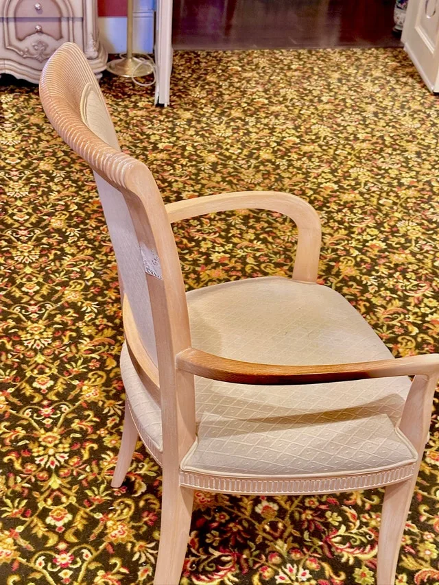 Contempory cream-upholstered armchair image indicator(2)