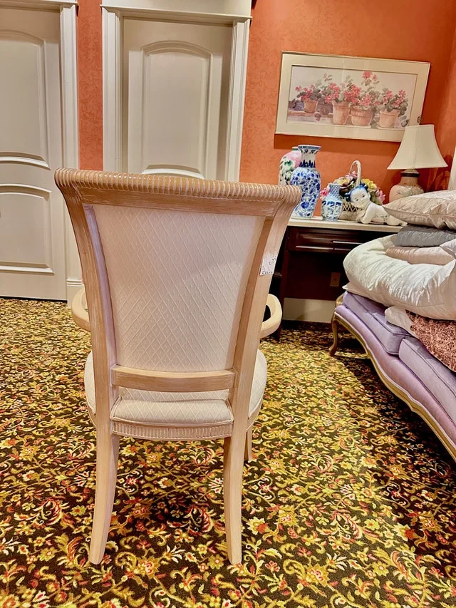 Contempory cream-upholstered armchair image indicator(3)