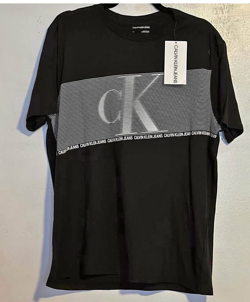 MENS TSHIRT SIZE: LARGE PRICE:$40 BRAND: CALVIN KLEIN